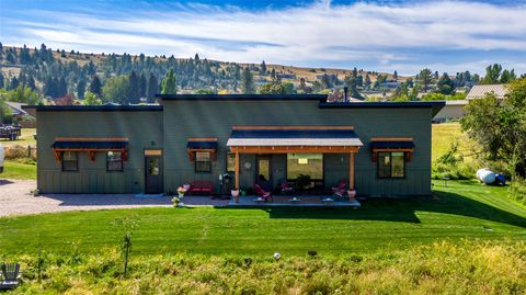 Tiny photo for 308 14th Avenue E, Polson, MT 59860 (MLS # 30070432)