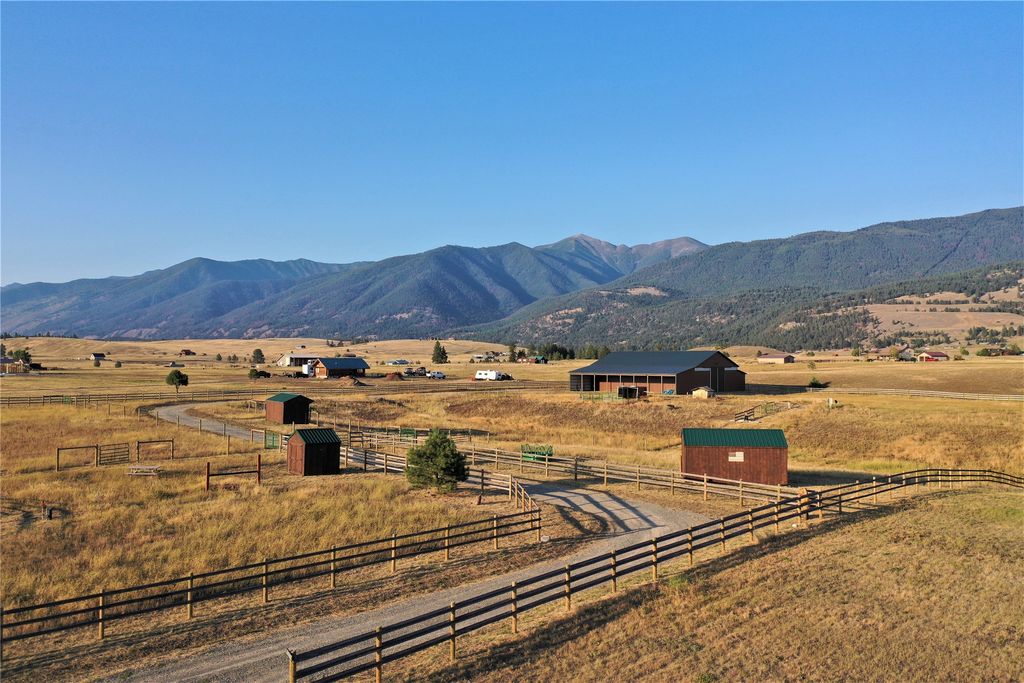 Photo of 5626 Airport Road, Eureka, MT 59917 (MLS # 30067093)