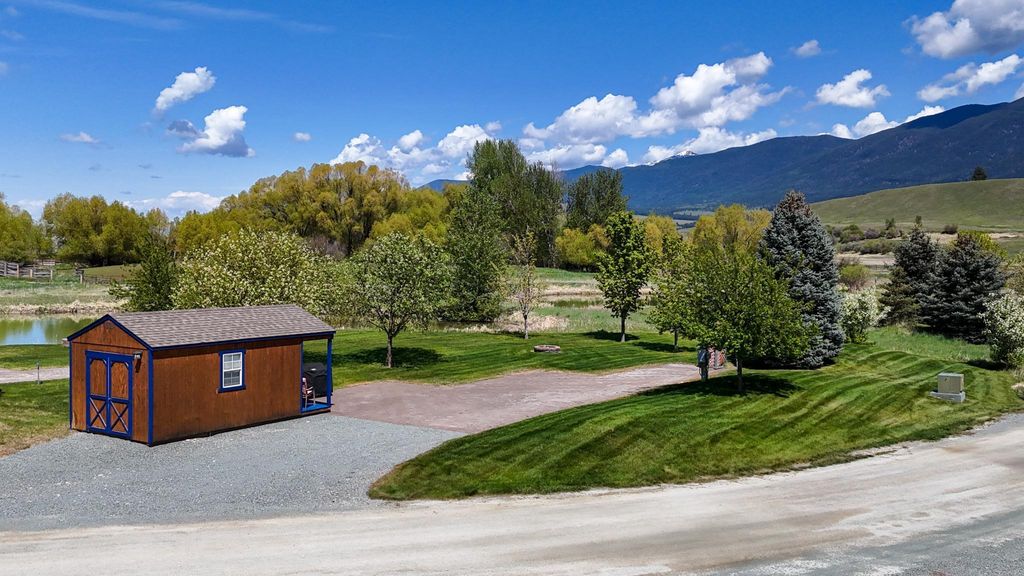 Photo of 438 Kingfisher Loop, Eureka, MT 59917 (MLS # 30068367)