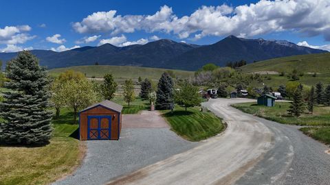 Photo of 438 Kingfisher Loop, Eureka, MT 59917 (MLS # 30068367)