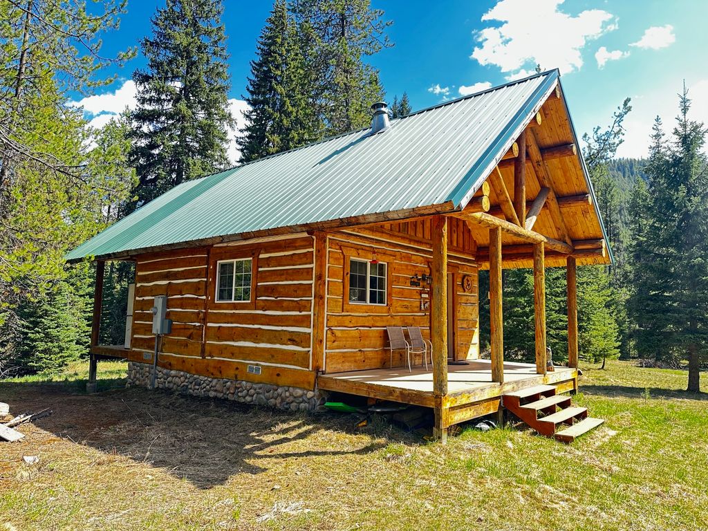 Photo of 1958 Packer Creek Road, Saltese, MT 59867 (MLS # 30070218)