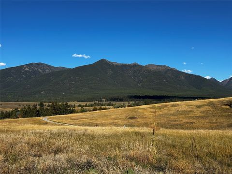 Photo of 172 Grassy Loop, Eureka, MT 59917 (MLS # 30059749)