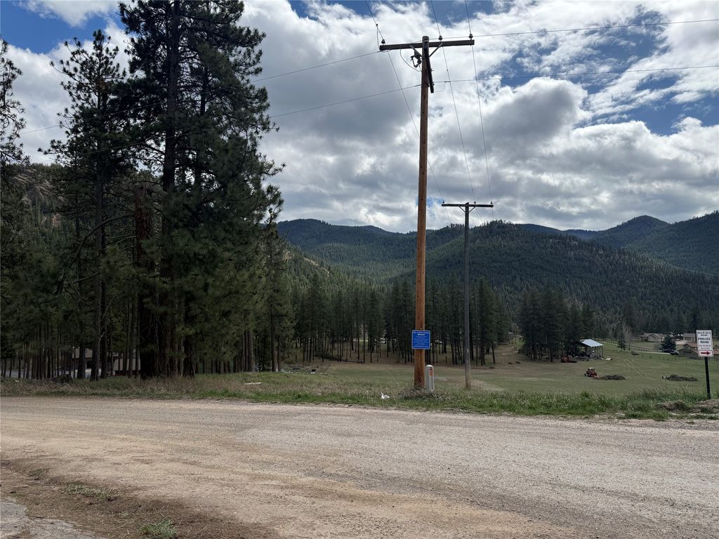 Photo of 15300 Big Horn Road, Huson, MT 59846 (MLS # 30068848)