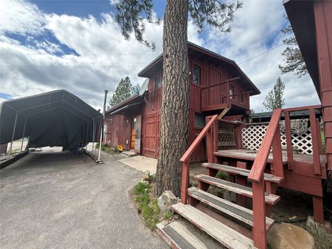 Photo of 15300 Big Horn Road, Huson, MT 59846 (MLS # 30068848)