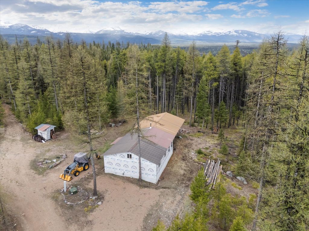 Photo of 1030 Old Barn Road, Seeley Lake, MT 59868 (MLS # 30069025)
