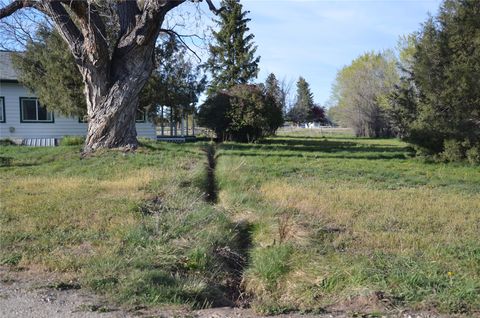Tiny photo for 901 Sleeping Child Road, Hamilton, MT 59840 (MLS # 30068898)