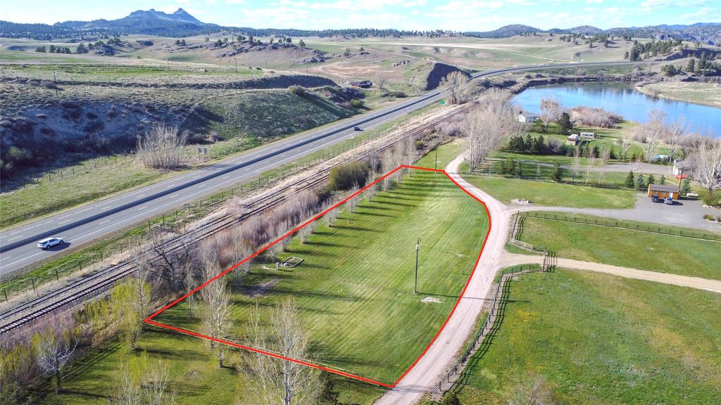 Photo of 156 Barnes Lane, Wolf Creek, MT 59648 (MLS # 30070027)