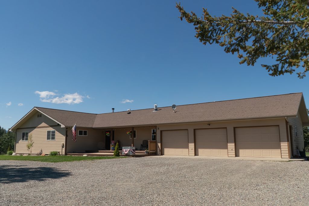 Photo of 117 Happy Hollow, Eureka, MT 59917 (MLS # 30070132)