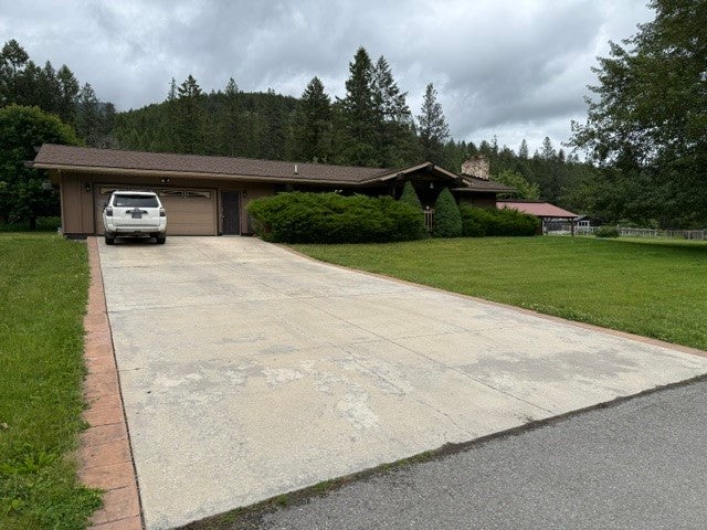 Photo of 939 Greers Ferry Road, Libby, MT 59923 (MLS # 30072046)
