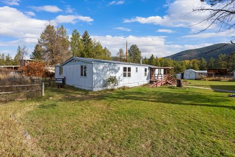 Photo of 985 Farm To Market Road, Libby, MT 59923 (MLS # 30058630)