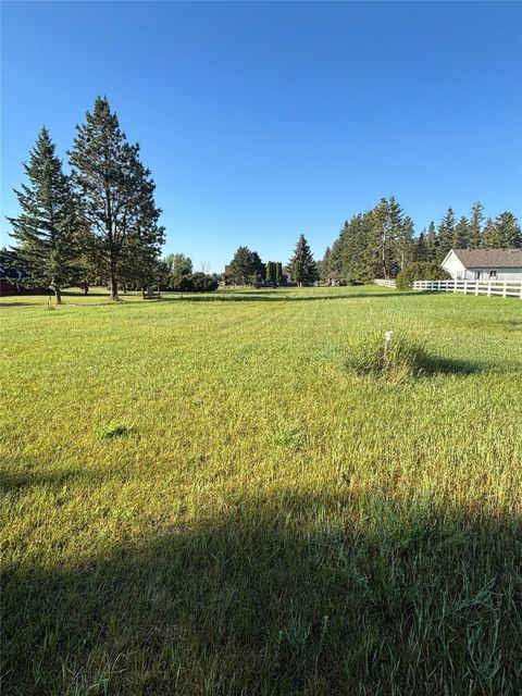 Photo of NHN Thompson Lane, Kalispell, MT 59901 (MLS # 30053579)