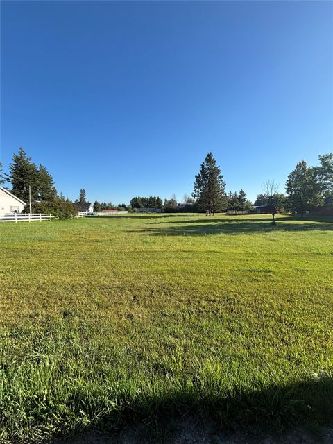 Photo of NHN Thompson Lane, Kalispell, MT 59901 (MLS # 30053579)
