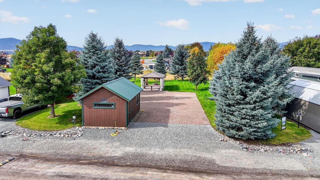 Photo of 305 Kingfisher Loop, Eureka, MT 59917 (MLS # 30078759)