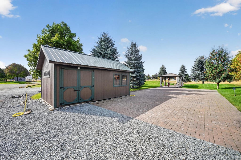 Photo of 305 Kingfisher Loop, Eureka, MT 59917 (MLS # 30078759)