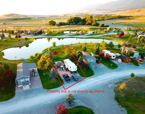 Photo of 185 Kingfisher Loop, Eureka, MT 59917 (MLS # 30065915)