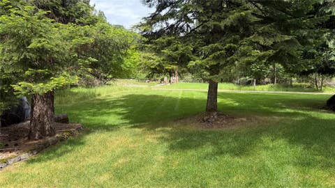 Tiny photo for 5671 Kootenai River Road, Libby, MT 59923 (MLS # 30072280)