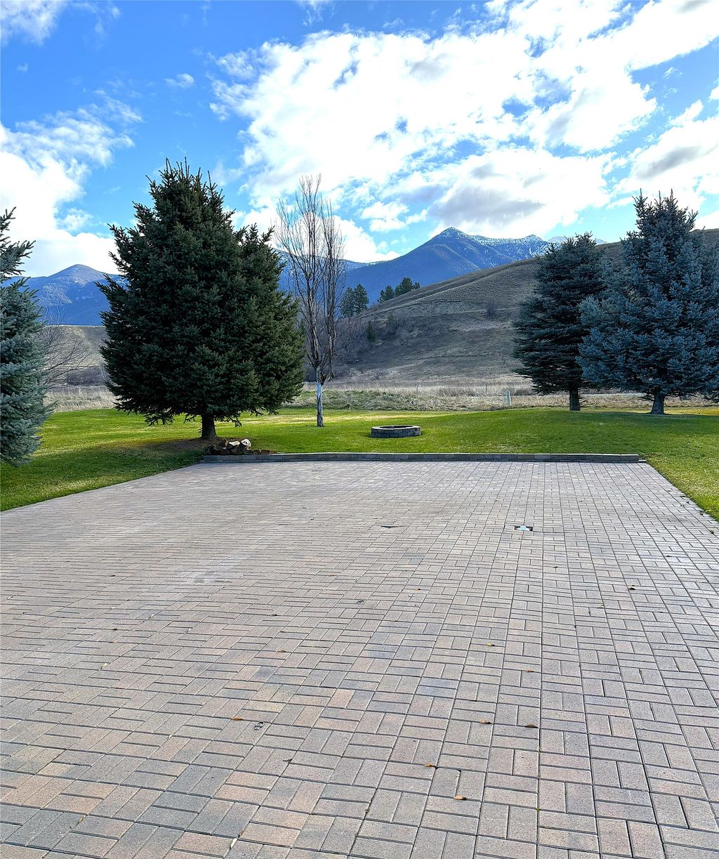 Photo of 342 Kingfisher Loop, Eureka, MT 59917 (MLS # 30067539)