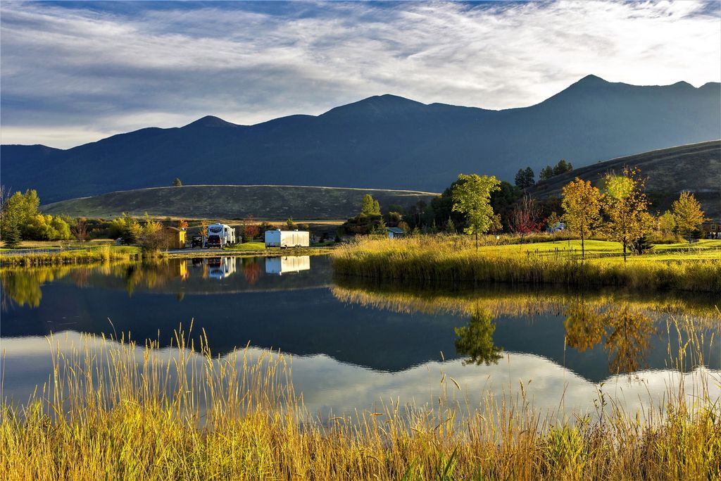 Photo of 342 Kingfisher Loop, Eureka, MT 59917 (MLS # 30067539)