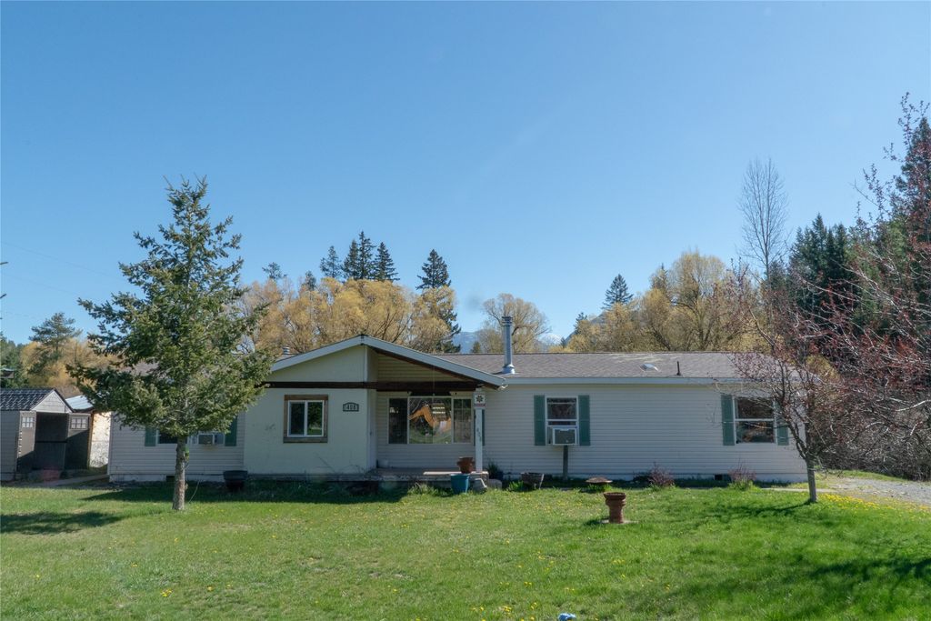 Photo of 408 Coram Stage Road, Coram, MT 59913 (MLS # 30069874)