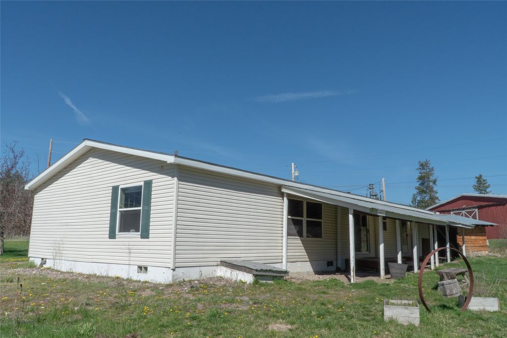 Photo of 408 Coram Stage Road, Coram, MT 59913 (MLS # 30069874)