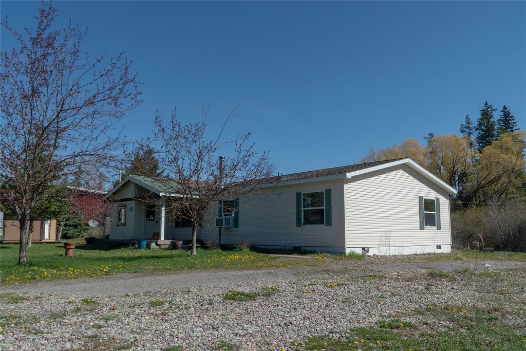 Photo of 408 Coram Stage Road, Coram, MT 59913 (MLS # 30069874)