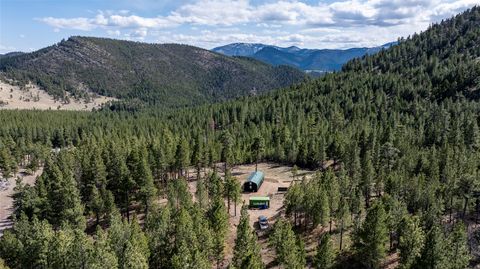 Photo of 3080 Allen Gulch Road, Wolf Creek, MT 59648 (MLS # 30070242)