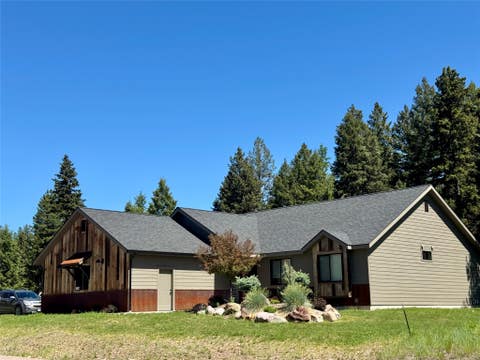 Photo of 179 Silvertip Trail, Seeley Lake, MT 59868 (MLS # 30072616)