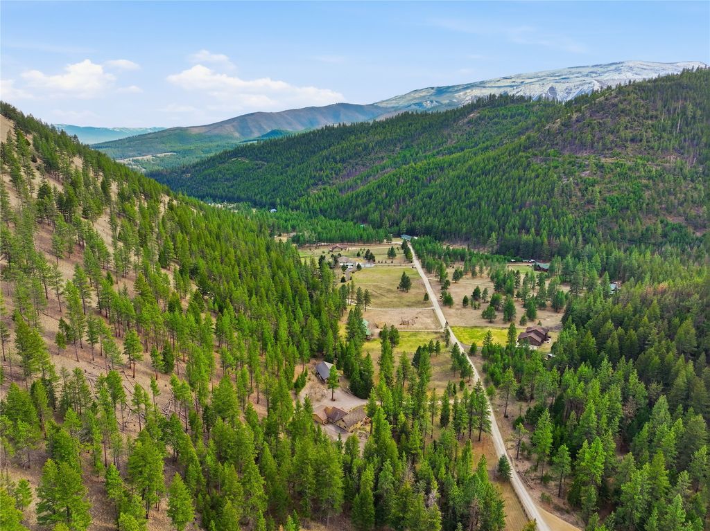 Photo of 10200 Sleeman Creek Road, Lolo, MT 59847 (MLS # 30067440)
