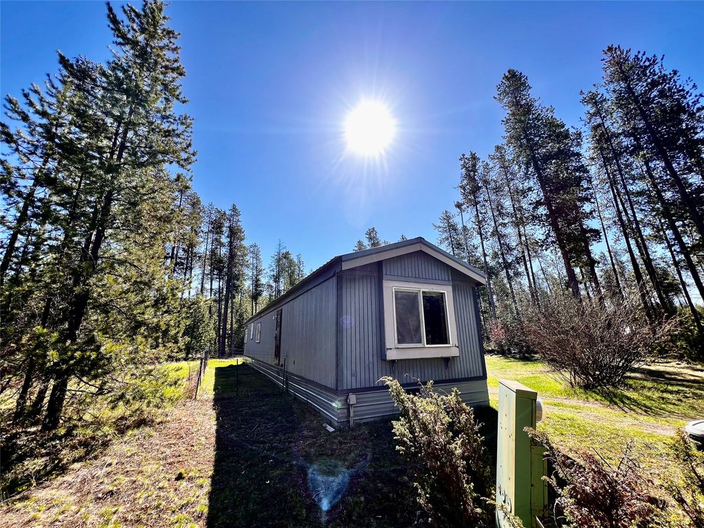 Photo of 133 Trout Avenue, Coram, MT 59913 (MLS # 30070122)