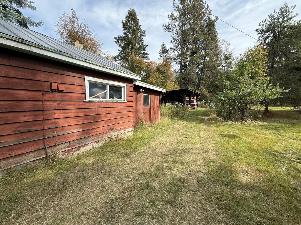 Photo of 276 Dolphin Way, Libby, MT 59923 (MLS # 30078874)
