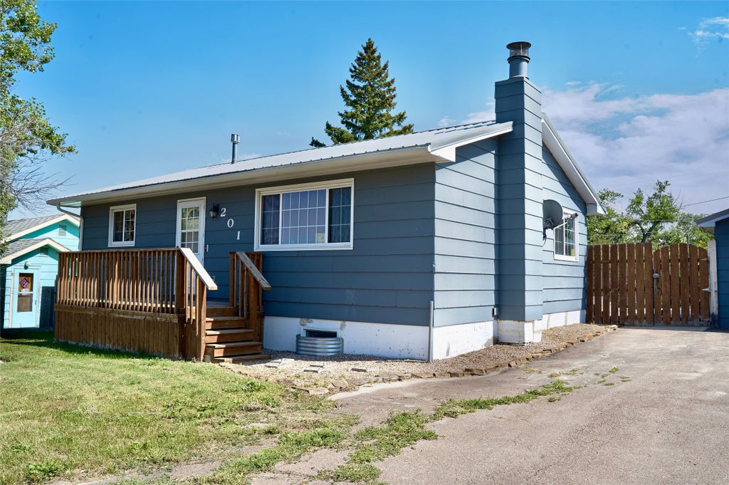 Photo of 201 5th Avenue NE, Cut Bank, MT 59427 (MLS # 30077709)