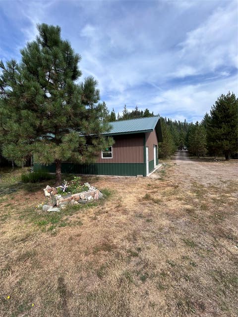 Tiny photo for 297 Cabin City Loop, St Regis, MT 59866 (MLS # 30076103)
