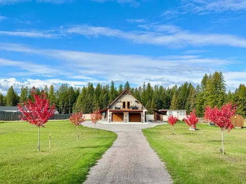 Photo of 205 Kinnikinnick Lane, Columbia Falls, MT 59912 (MLS # 30056205)