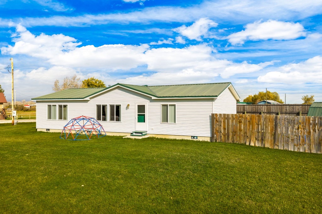 Photo of 220 Columbus Avenue, Dupuyer, MT 59432 (MLS # 30080144)