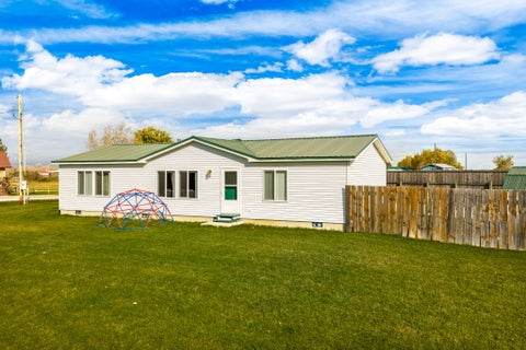 Photo of 220 Columbus Avenue, Dupuyer, MT 59432 (MLS # 30080144)