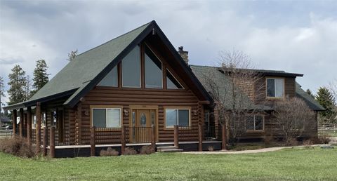 Photo of 1040 Cowboy Way, Columbia Falls, MT 59912 (MLS # 30056923)
