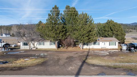 Photo of 24160 Huson Road, Huson, MT 59846 (MLS # 30064235)