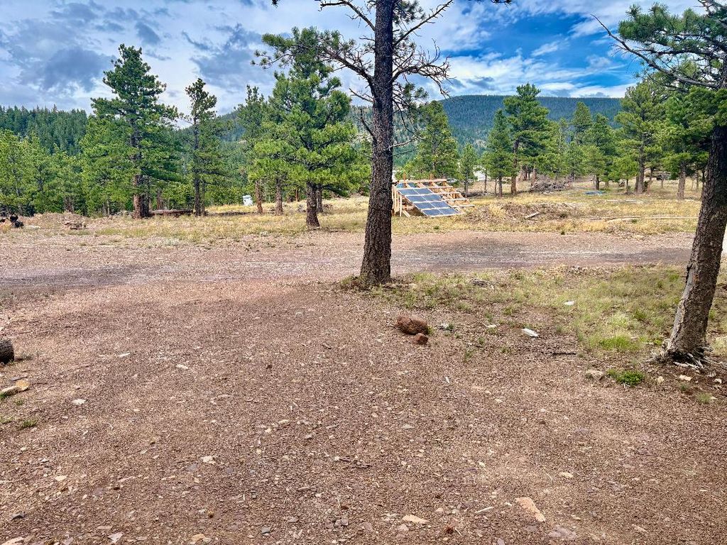 Photo of 4535 Little Wolf Creek Road, Wolf Creek, MT 59648 (MLS # 30060521)