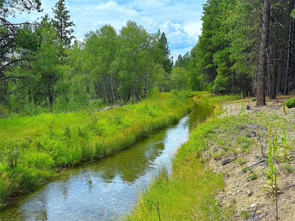 Photo of Nhn Pomeroy Trail, Eureka, MT 59917 (MLS # 30068293)