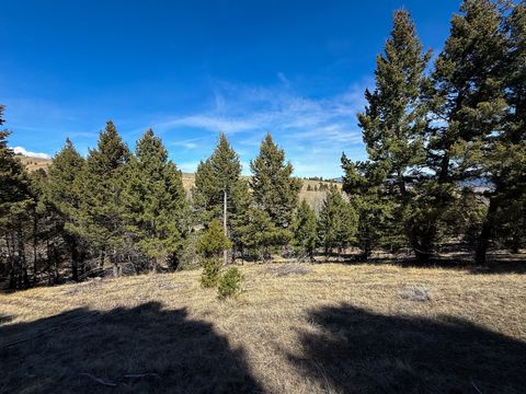 Tiny photo for TBD Lone Pine Gulch Road, Ramsay, MT 59748 (MLS # 30069160)