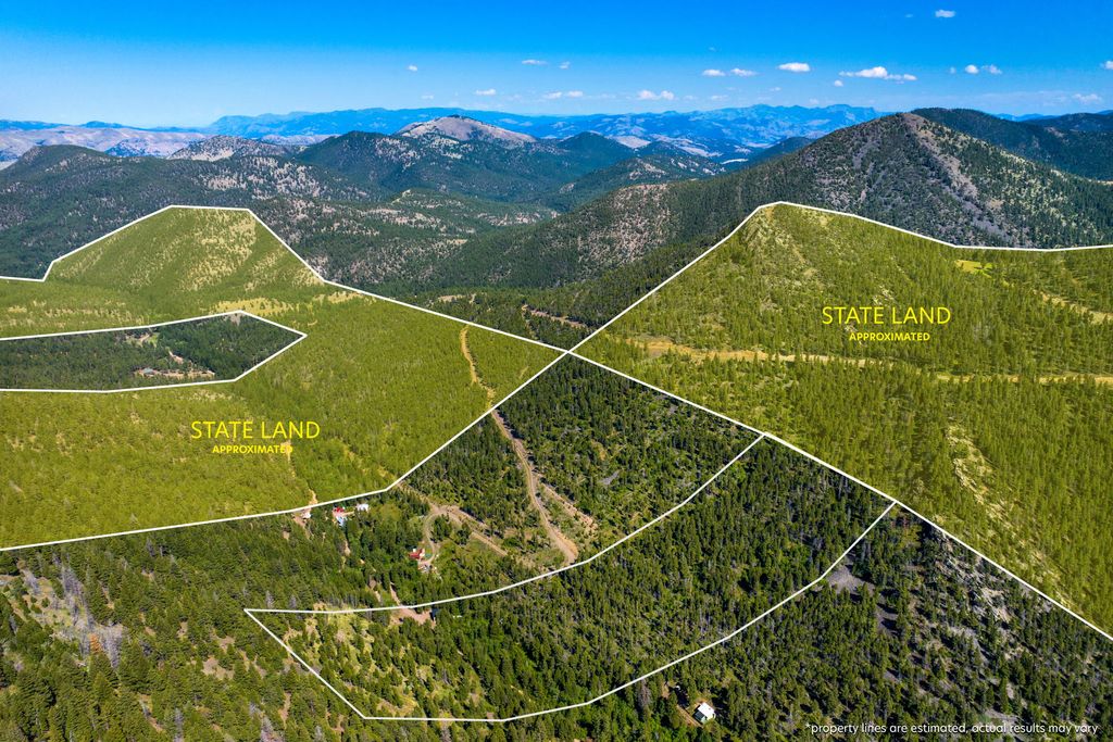 Photo of 4253 Woods Creek Road, Wolf Creek, MT 59648 (MLS # 30066472)