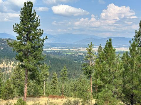Photo of 36 Bighorn Bluff Loop, Plains, MT 59859 (MLS # 30065889)