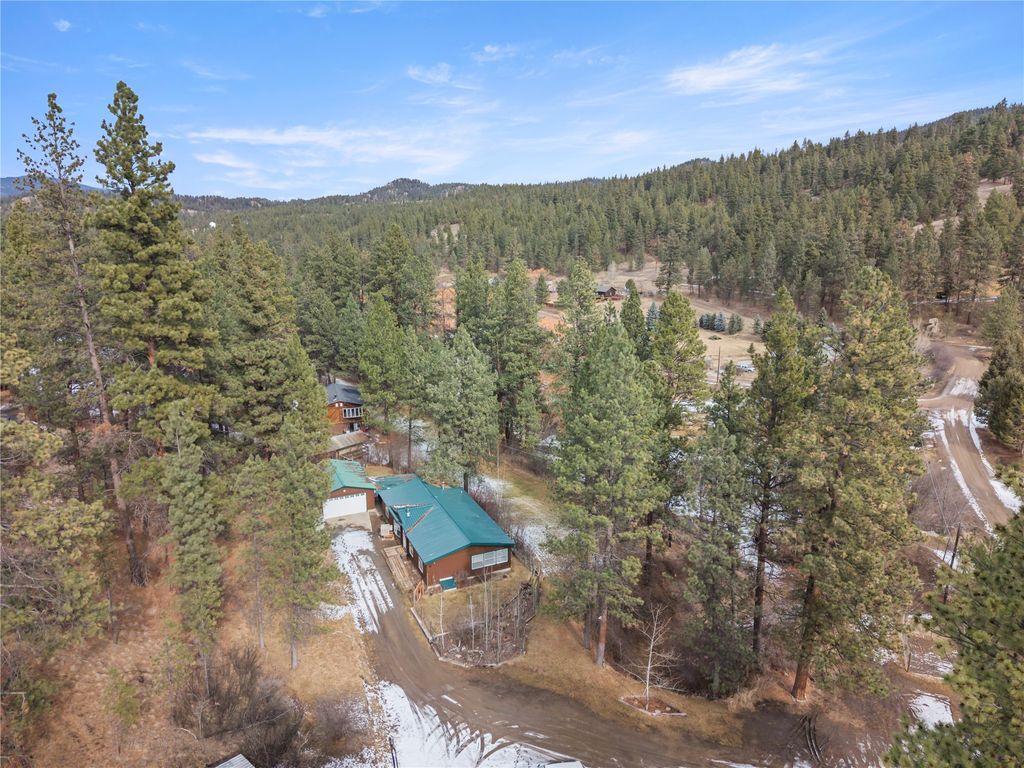 Photo of 53 Woodland Park Loop, Clancy, MT 59634 (MLS # 30066037)