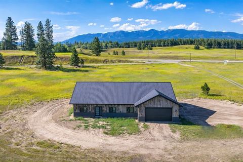 Photo of 405 Sandy Hill Lane, Columbia Falls, MT 59912 (MLS # 30047907)