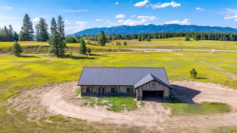 Photo of 405 Sandy Hill Lane, Columbia Falls, MT 59912 (MLS # 30047907)