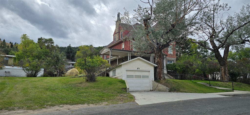 Photo of 909 Flowerree Street, Helena, MT 59601 (MLS # 30079640)