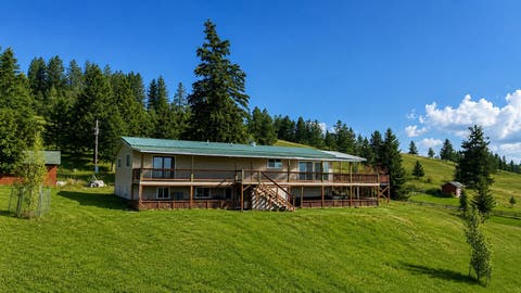 Photo of 319 Scenic Drive, Eureka, MT 59917 (MLS # 30074280)