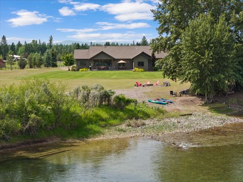 Photo of 1398 Waters Edge Way, Columbia Falls, MT 59912 (MLS # 30052343)