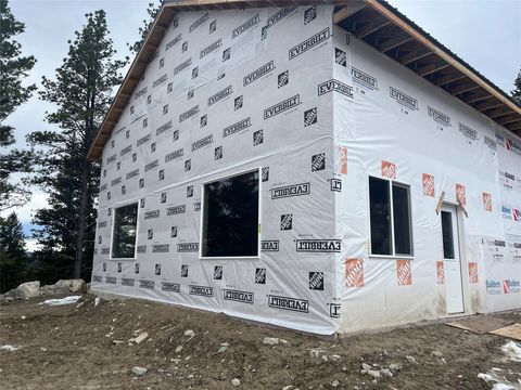 Photo of 670 Triplett Road, Kalispell, MT 59901 (MLS # 30066620)