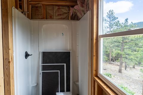 Tiny photo for 1300 Rogers Creek Road, Wolf Creek, MT 59648 (MLS # 30070738)